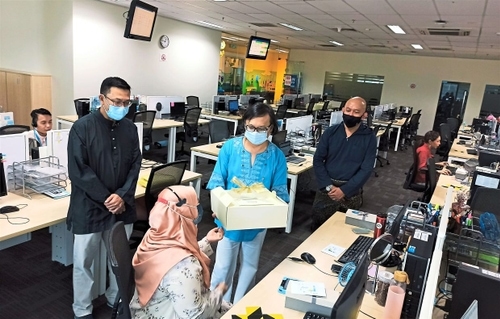 Companies bring cheer to their staff on duty during Raya