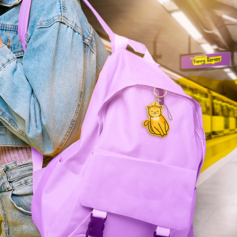 Carry Charm on your backpack